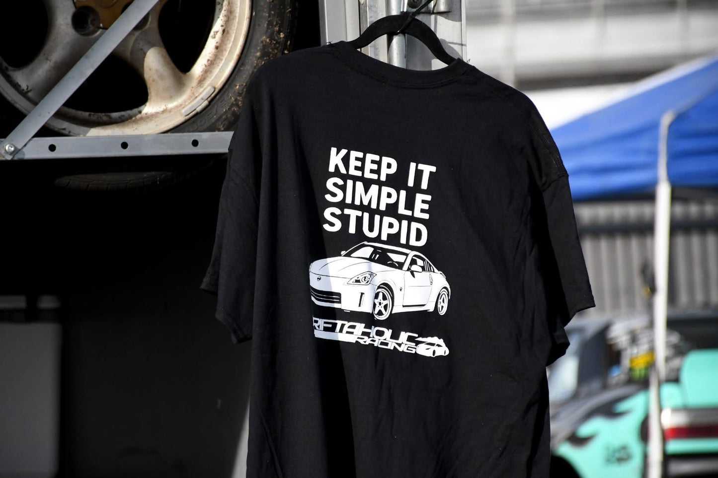 Driftaholic Racing Keep It Simple Stupid 350Z shirt hanging at the track
